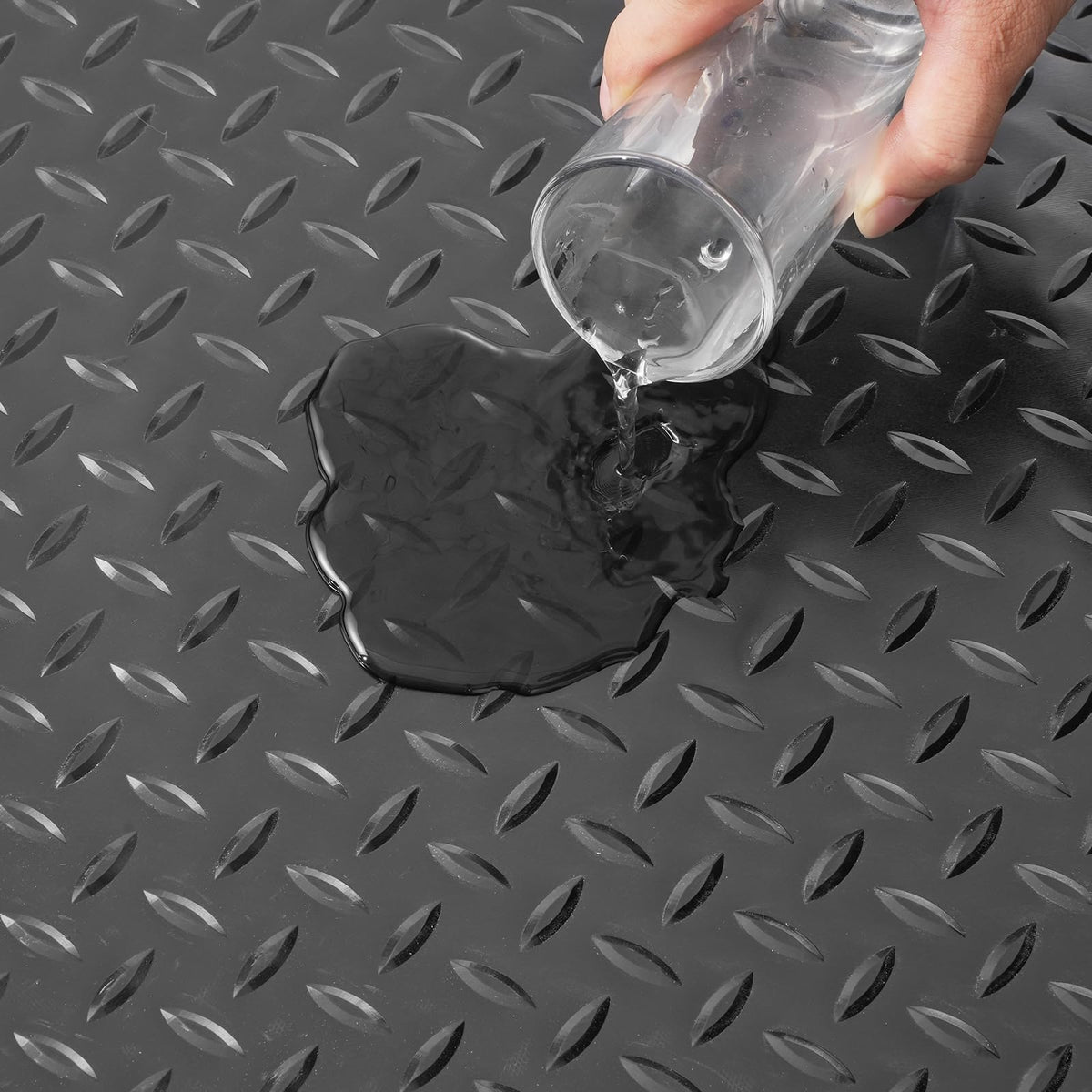 VEVOR black garage floor mat offers sleek look and protection.