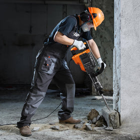 VEVOR demolition hammer in action for trenching and breaking concrete