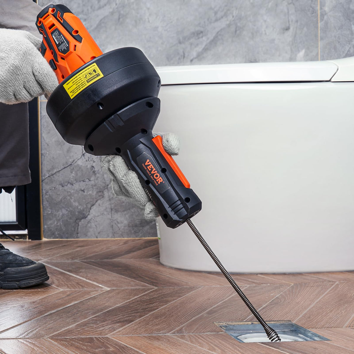 VEVOR drain cleaner being used indoors and outdoors