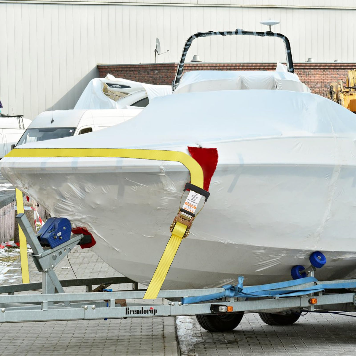 VEVOR trailer-bed ratchet strap in action keeping cargo steady