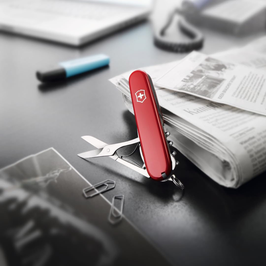 Victorinox Compact knife showing bottle and can opener for quick refreshments.