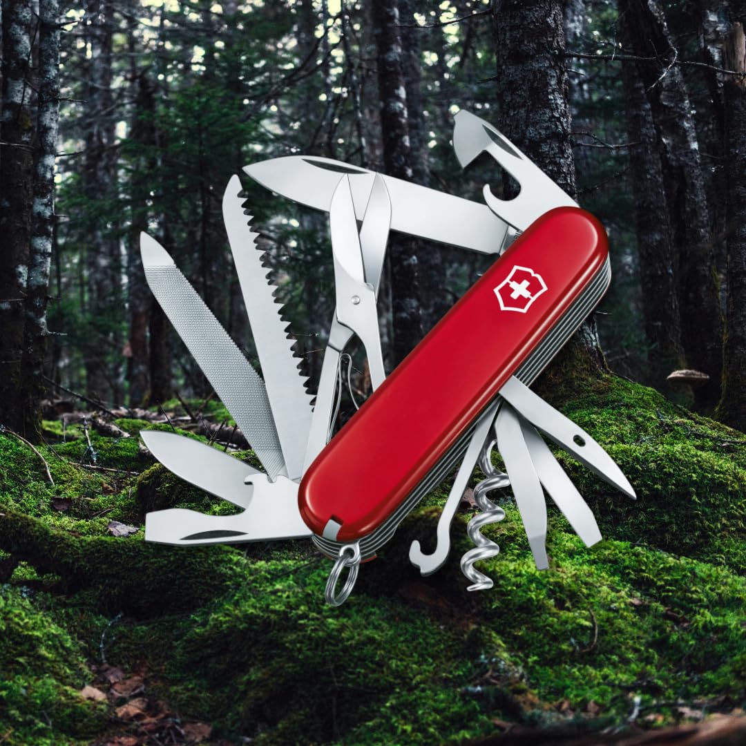 Victorinox Ranger wood saw in use for campsite preparation and quick repairs
