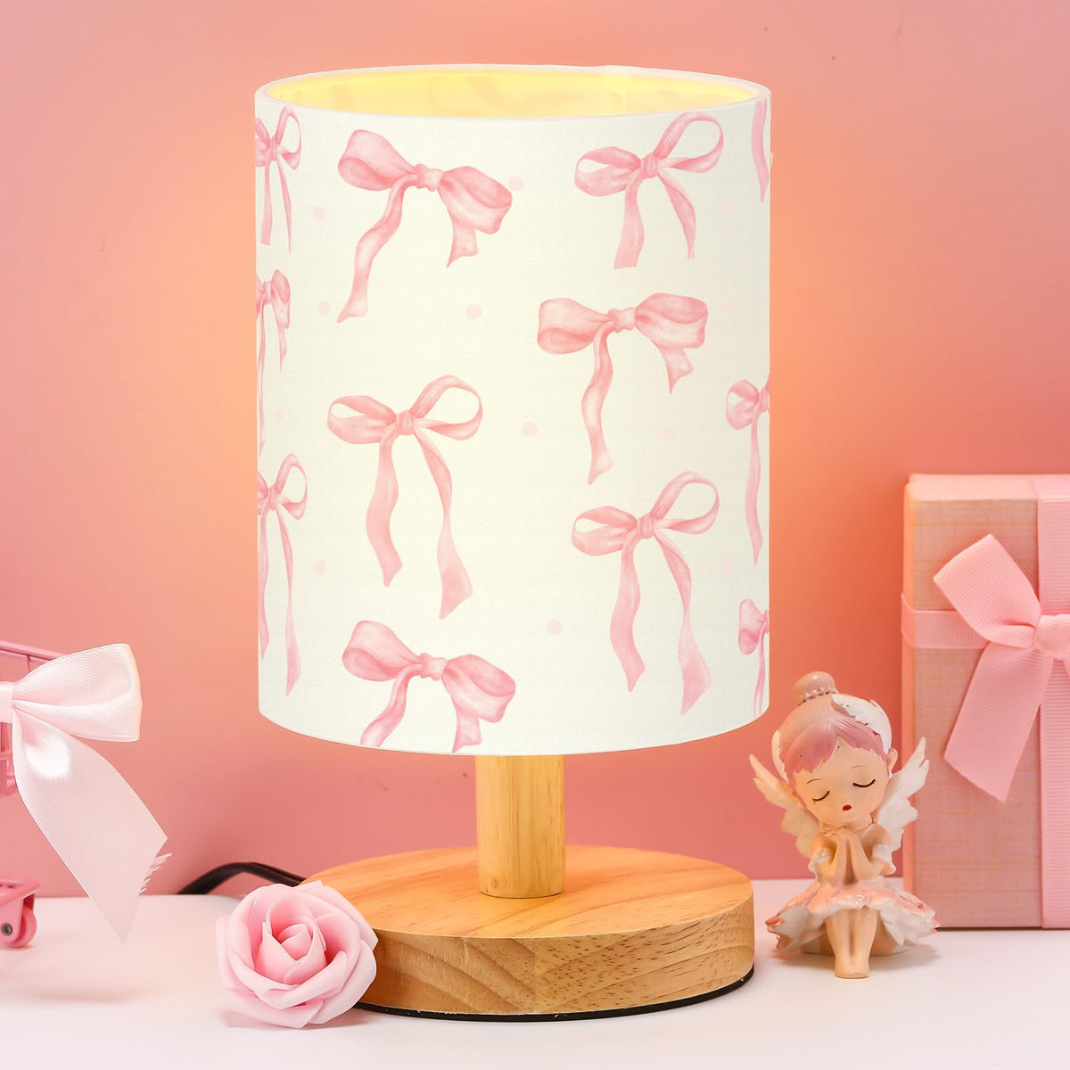 VIHOSE Bow Kids Table Lamp with linen shade provides warm bedside lighting