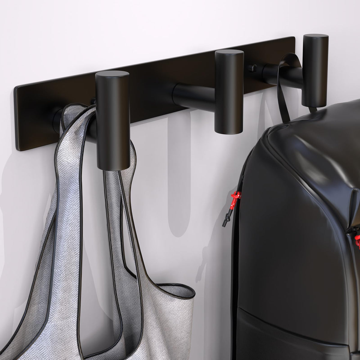 VINHOLD wall-mounted coat rack three hooks side view highlights compact design
