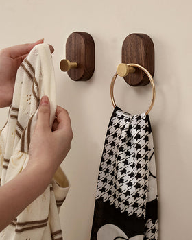 Vinoil two-pack coat hooks organizing coats, bags, and towels.