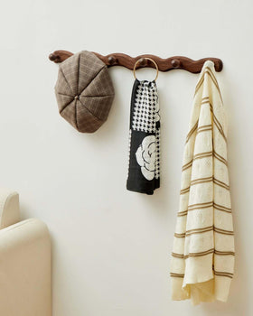 Compact 15.4 inch length Vinoil coat rack fits small spaces.