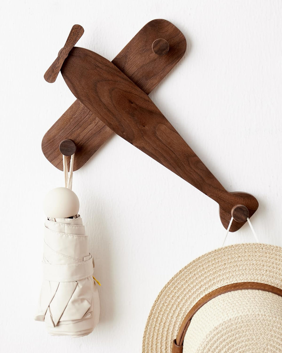 Vinoil Kids Coat Rack airplane wall mount keeps kid's coats organized in the nursery