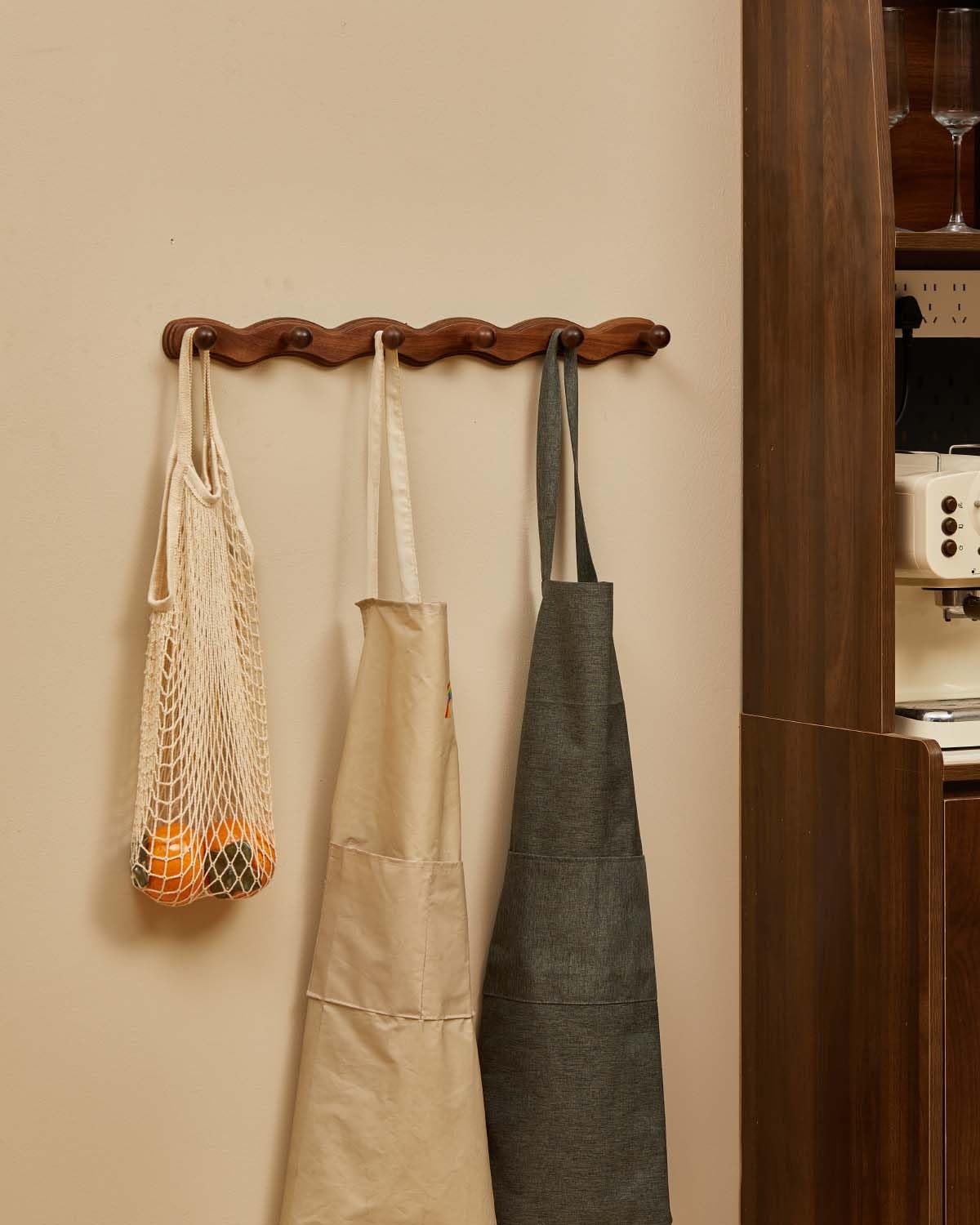 Smooth finish detail on Vinoil wall rack protecting fabrics.