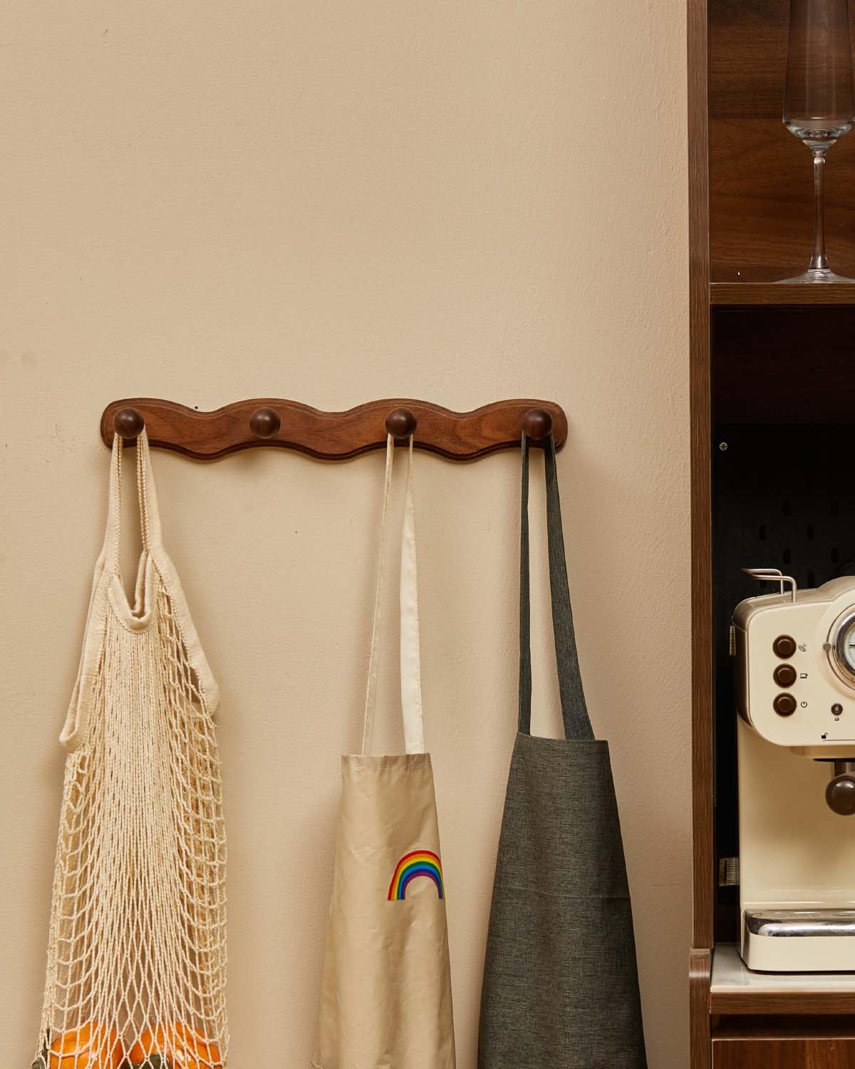 Vinoil wooden coat hooks in entryway with smooth finish protects fabrics.