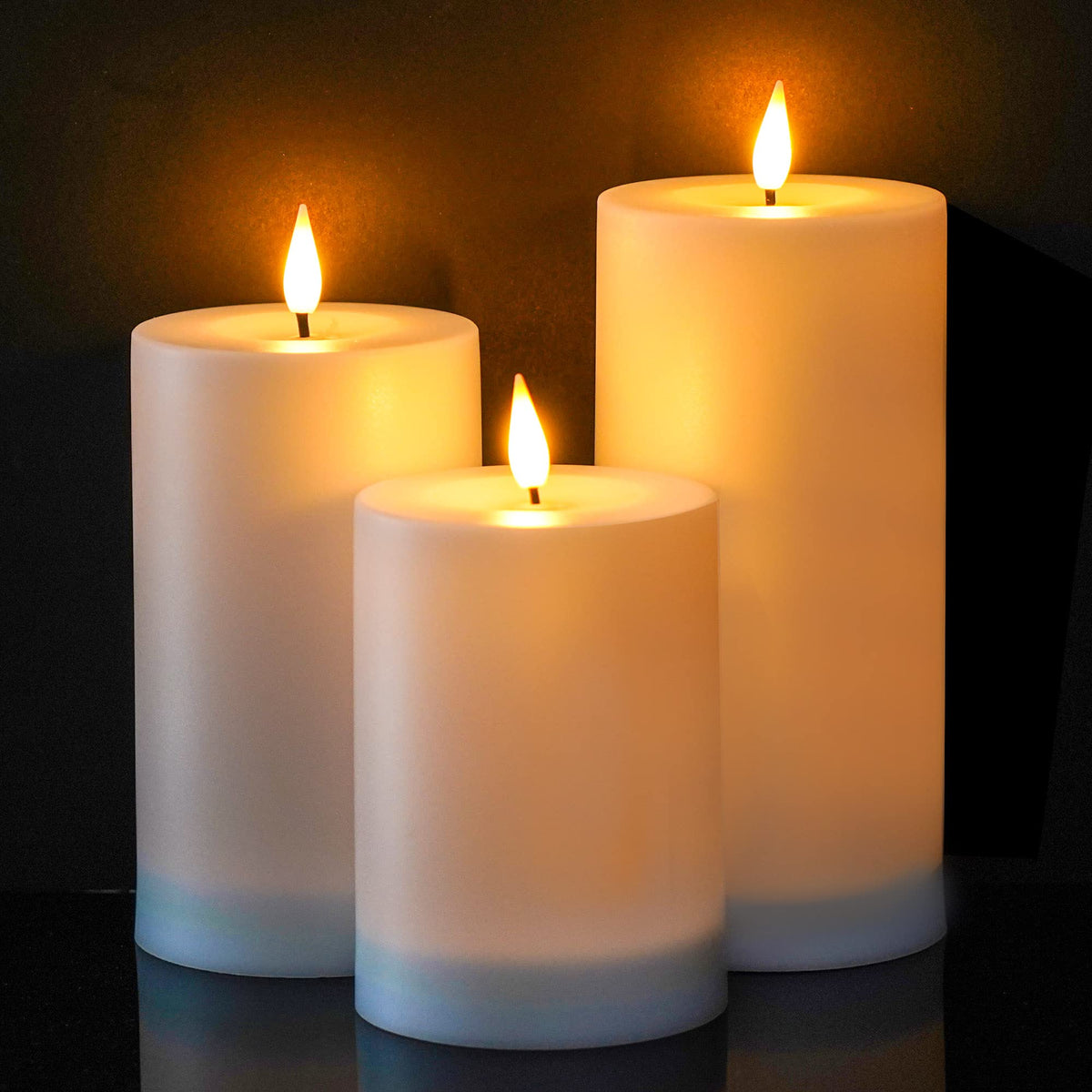 VIODAIM 4-inch pillar solar candle glows softly for outdoor ambience.