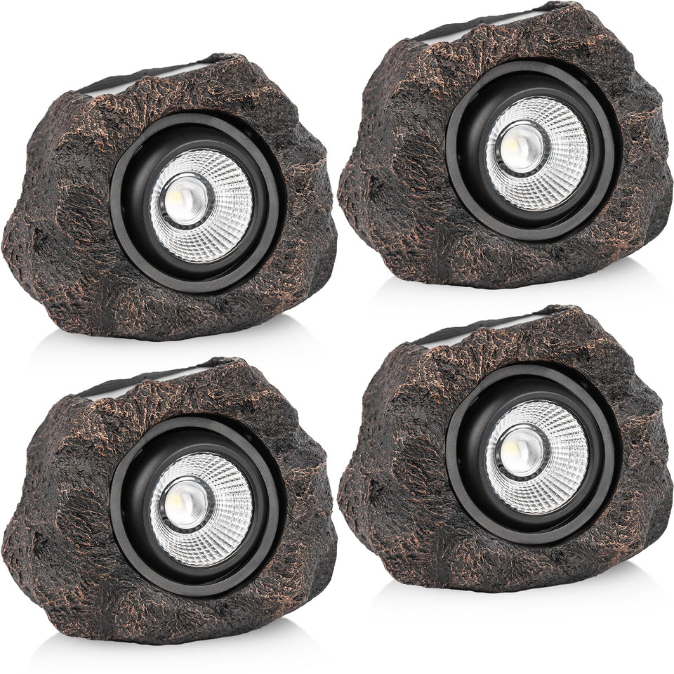 VISFLAIR Solar Rock Lights Outdoor 4-Pack with realistic stone texture illuminating pathways in your garden.