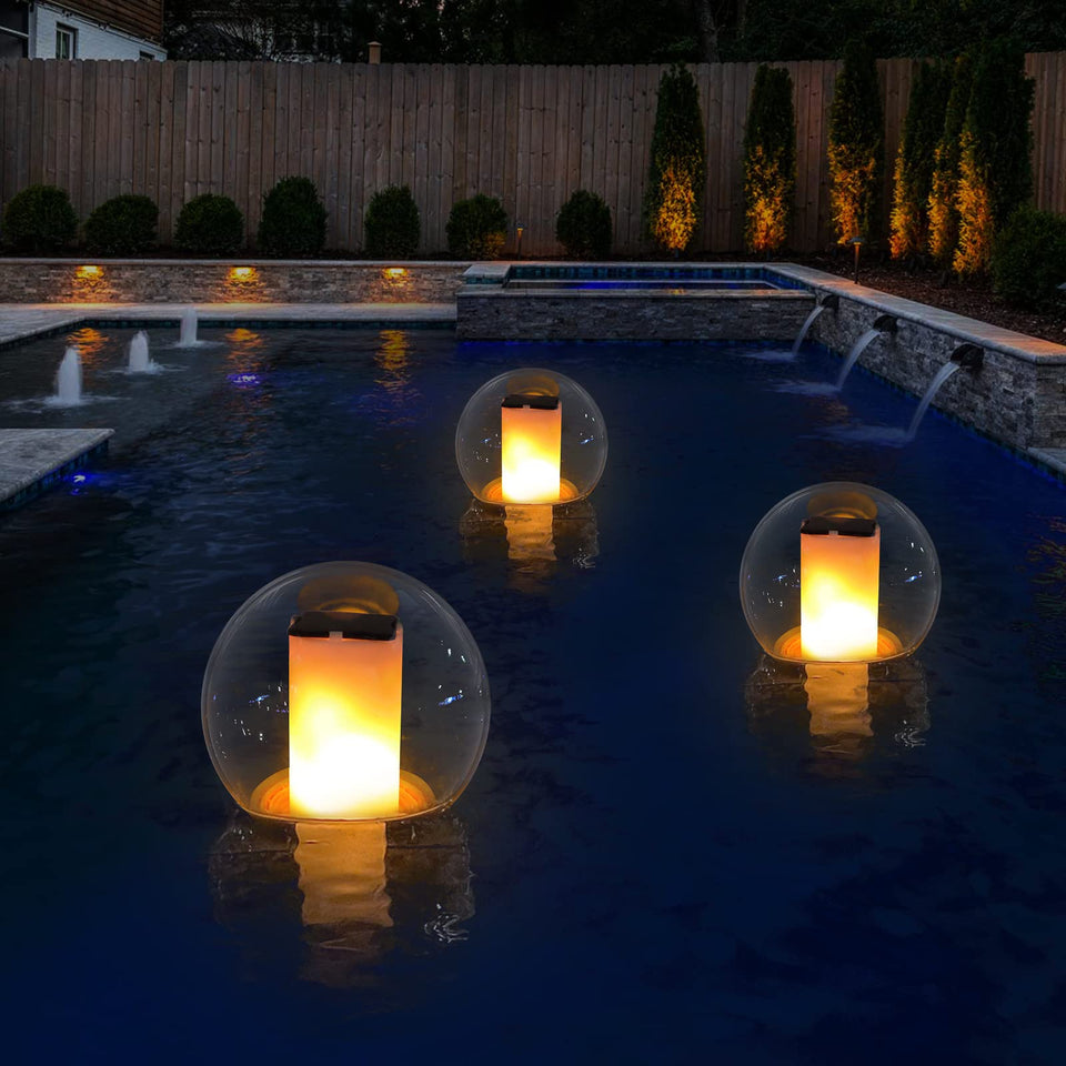 VISOFO floating globe over a pool creates a warm, inviting glow.