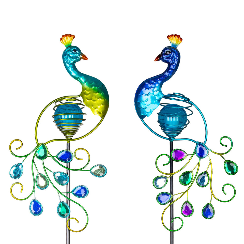 Viveta peacock solar light in the garden adds romantic glow and eco-friendly illumination.