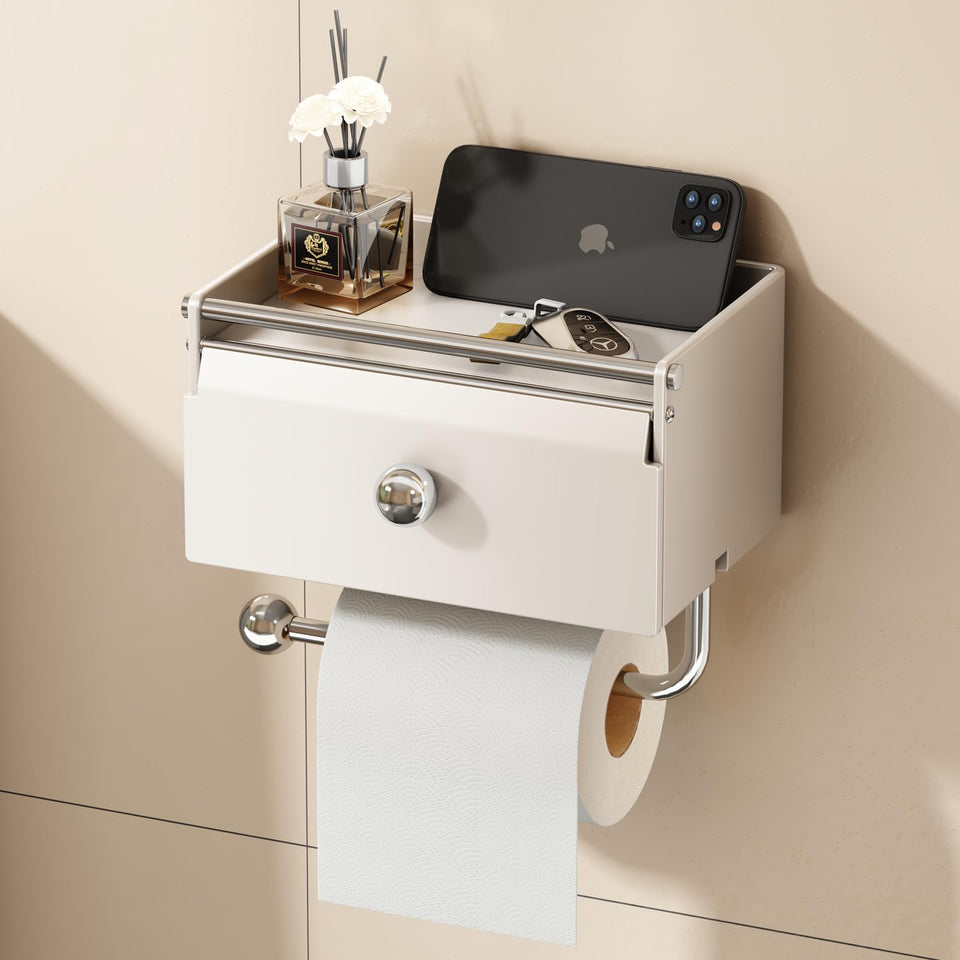 Voldra toilet paper holder with front flip lid keeps top items accessible yet protected.