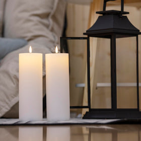 Volnyus remote-control candles demonstrating easy timer operation.