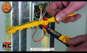 VoltClaw used near a breaker panel for nonconductive grip and guidance.