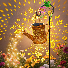 VOOKRY solar watering-can lights with hummingbird charm brighten evening garden paths