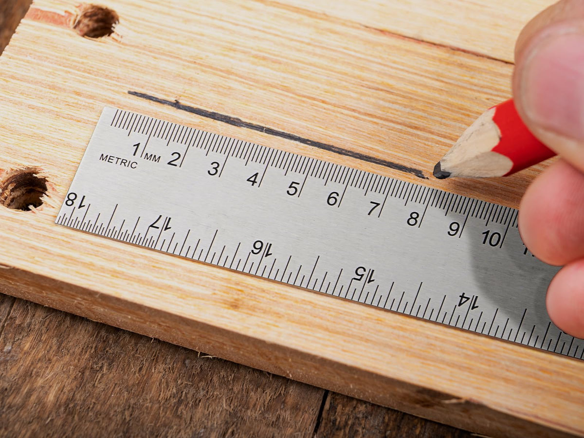 VORIGY stainless steel ruler with cork backing resists bending over time.
