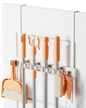 Vosturdy over-door mop and broom holder installed without drilling, keeps tools accessible.