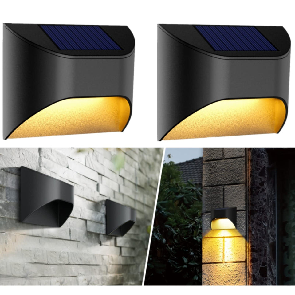 VWCYL+ solar fence lights two-pack brightening deck and stairs for safe nighttime navigation.