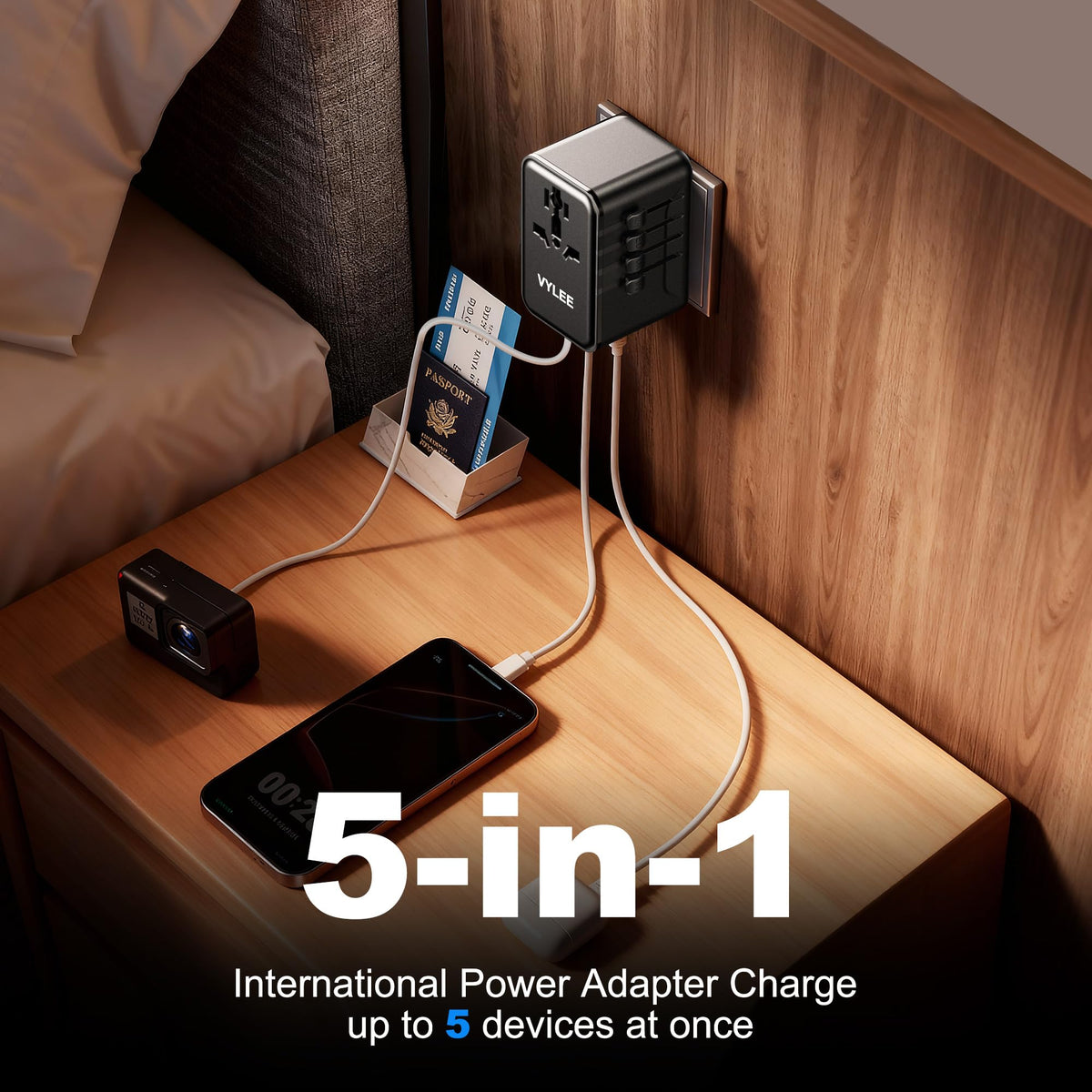 VYLEE universal travel adapter with Type G plug for UK sockets.