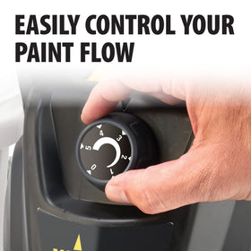 Spray gun in action with Wagner Control Pro 150 on exterior siding.