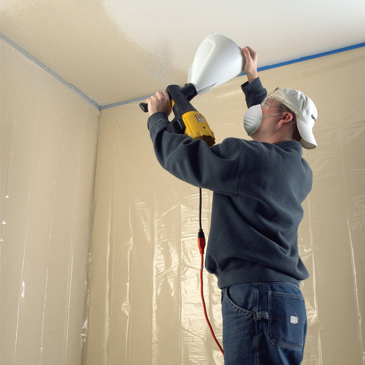 Wagner Power Tex ceiling spraying shows versatile texture options.