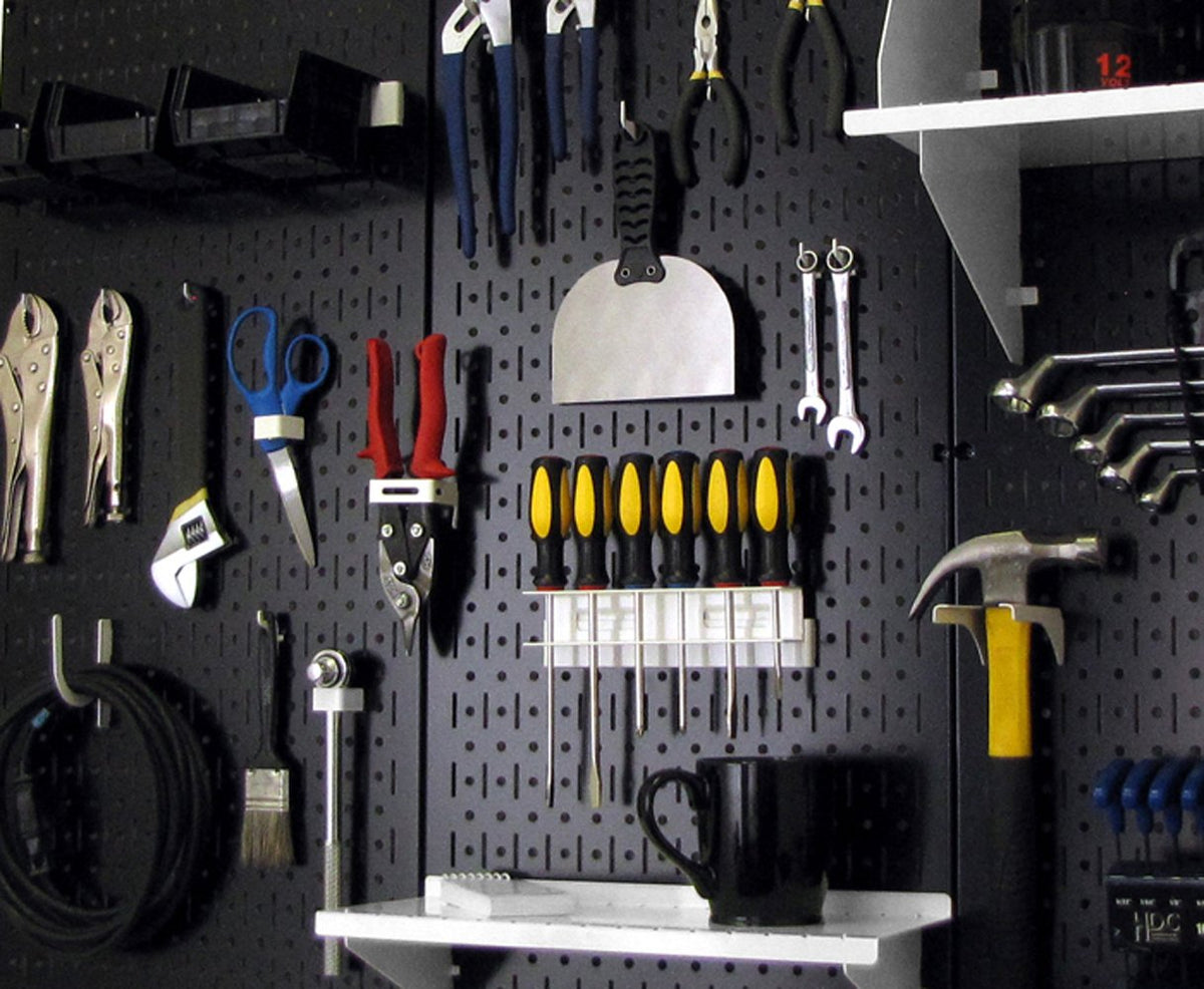 Close up of Wall Control pegboard holes and slots for secure hooks