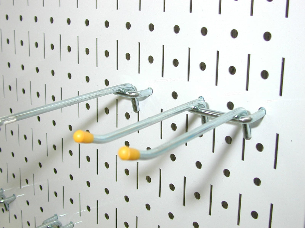Wall Control pegboard installation on stud wall illustrating direct mounting without framing.