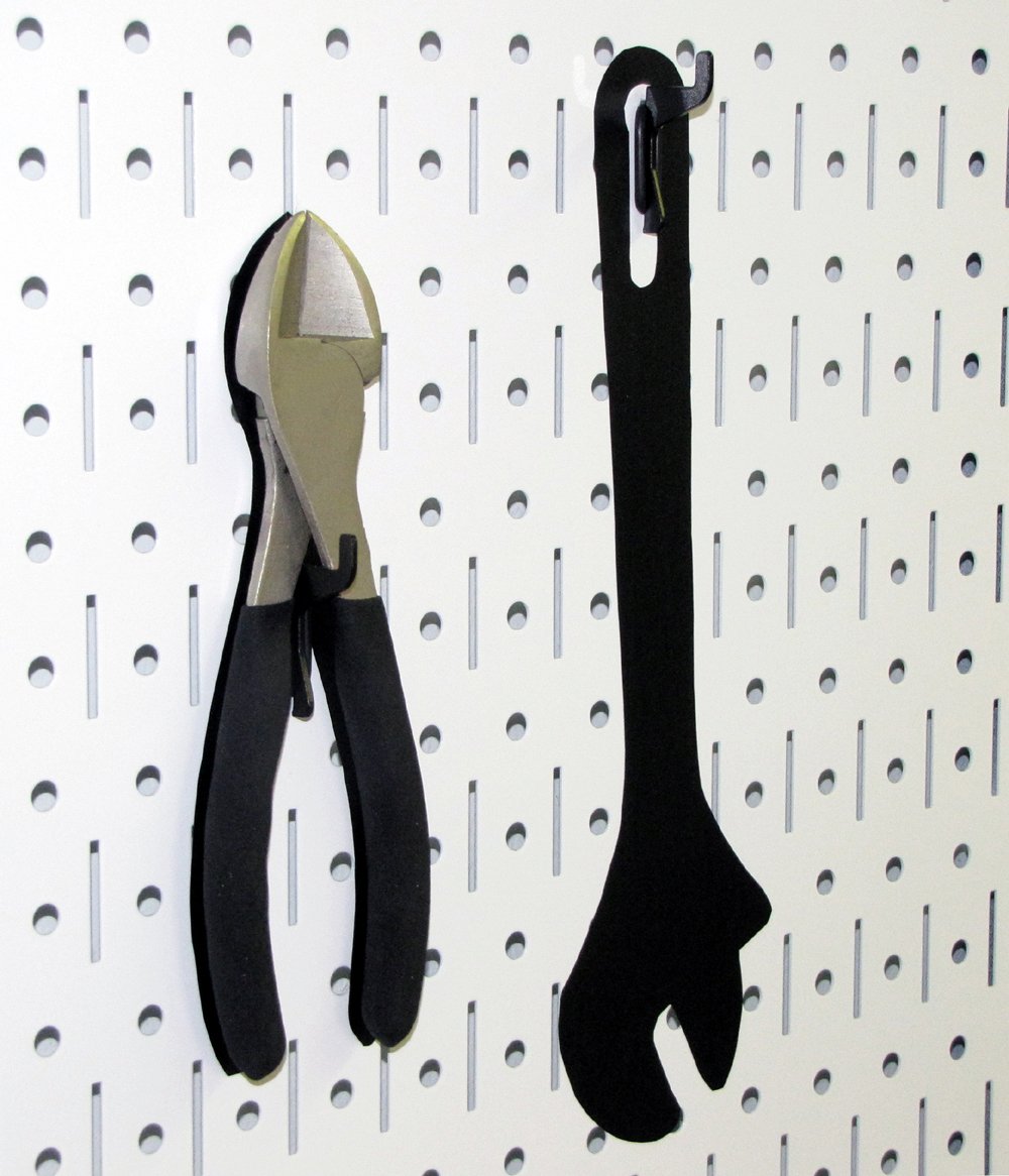 Wall Control compatible with slotted hooks and brackets for versatile setup.