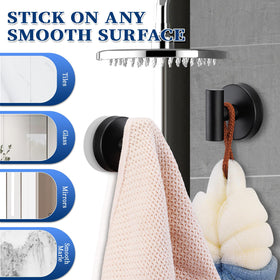 Warlve suction hook on glass shower door holding a loofah securely.