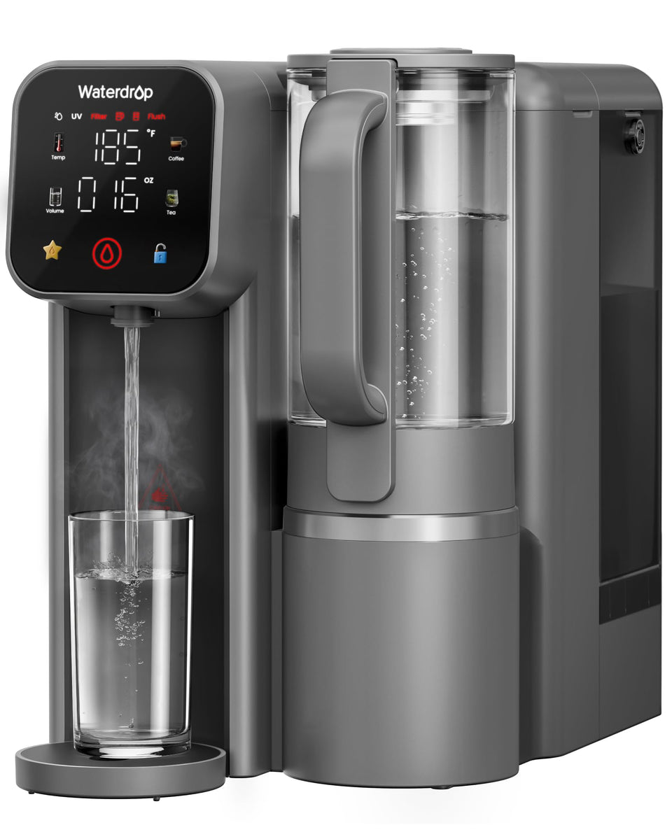 Waterdrop M6H on counter beside glass pitcher for easy hot water access