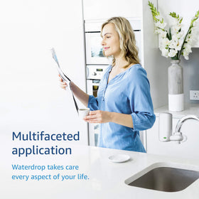 On-tap installation example showing sleek white Waterdrop adapter.