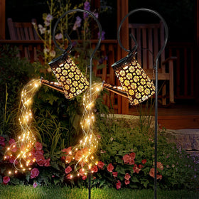 WDLFCGC solar watering can light two-pack brightens garden paths at dusk