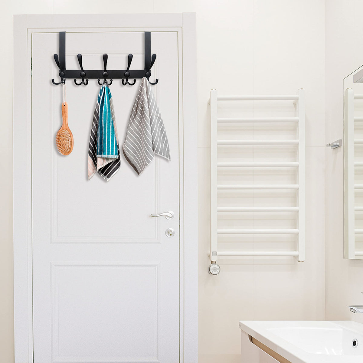 WEBI over door hook with padding guards surfaces and reduces noise.