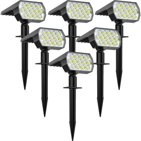 WELALO solar spot light brightens a dark walkway for safer night visibility.