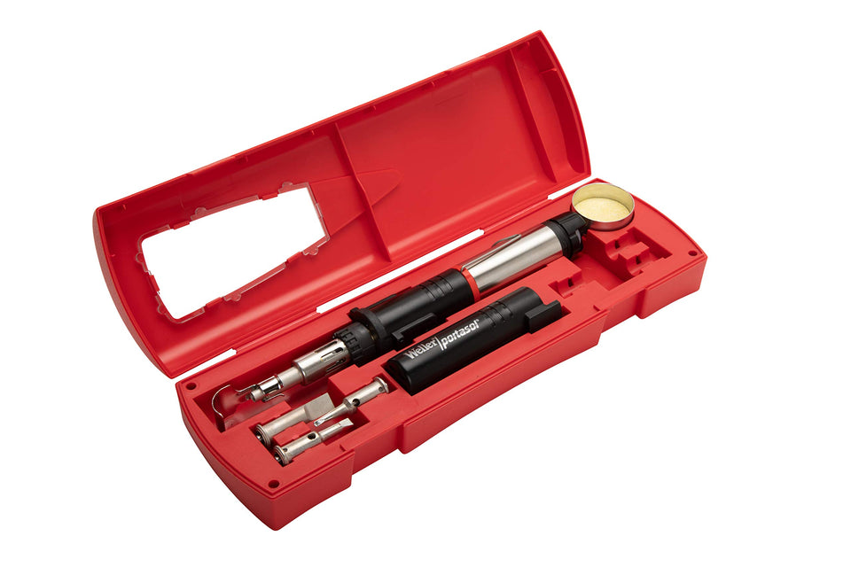 Weller PSI100K self-igniting cordless soldering iron in hand for quick field repairs.