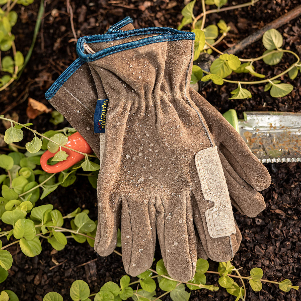 Wells Lamont glove slip-on wrist demonstrates secure fit and debris protection.