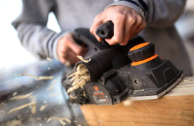 WEN 6534 dust port close-up emphasizes two-way dust collection