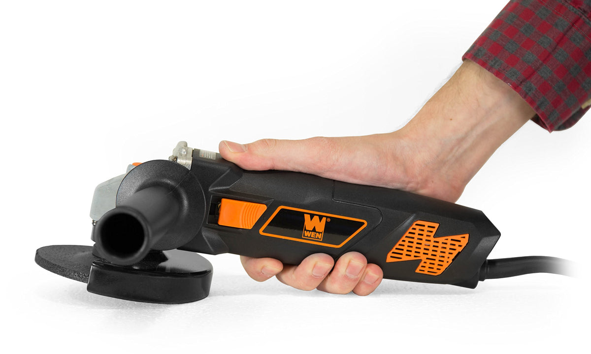 WEN angle grinder showing reversible handle for left and right-hand operation.