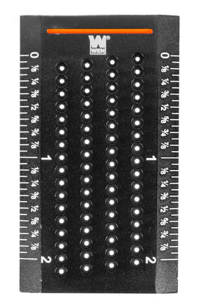 Close up of the 1 mm holes on the WEN ME899R for accurate line spacing.