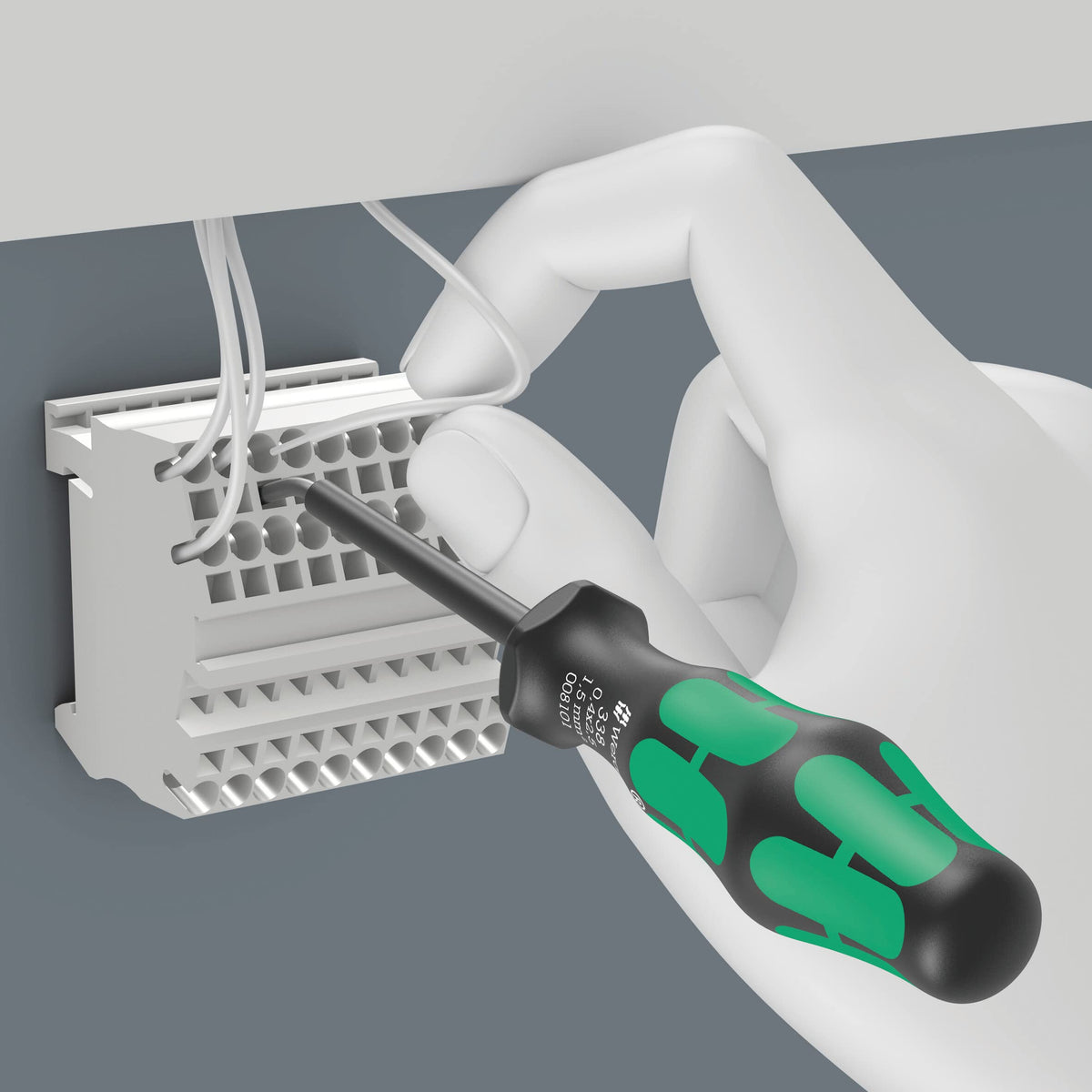 Wera actuation tool reaching tight spaces in distribution boxes with curved blade.