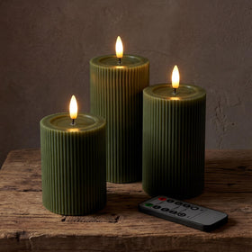West Ivory fluted ribbed LED pillar candle 4 inch in loden green for elegant table decor