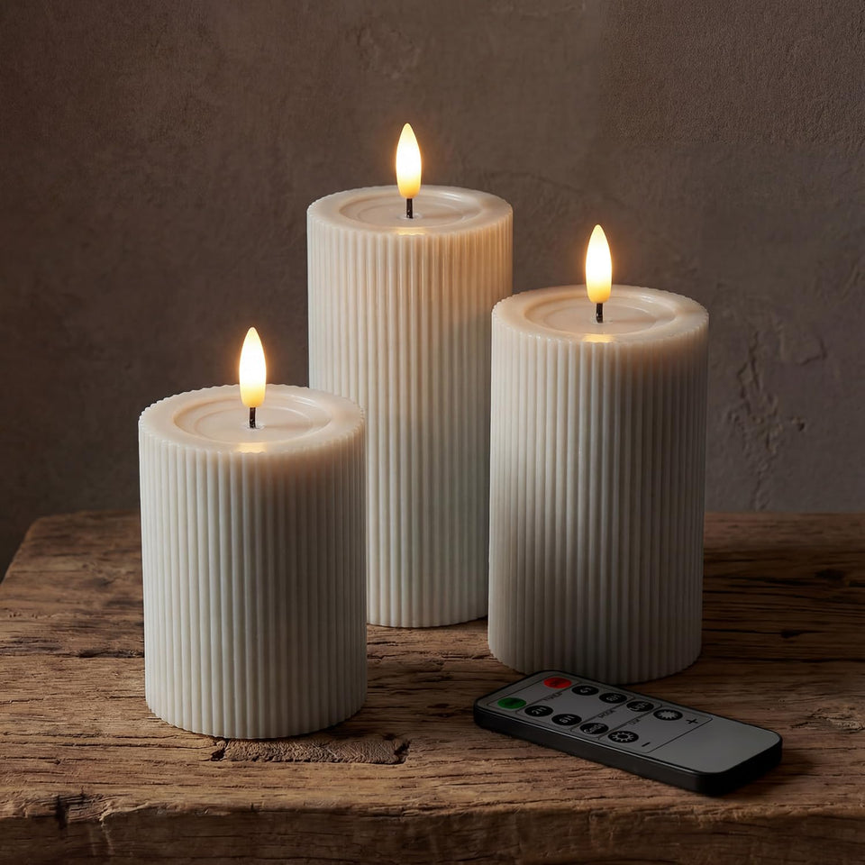West Ivory fluted ribbed LED pillar candle 4-inch for elegant dining ambiance.