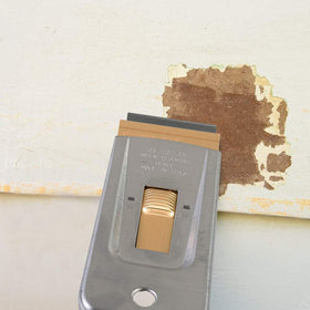 WEUPE Razor Scraper clears adhesive residue from tiles and glass