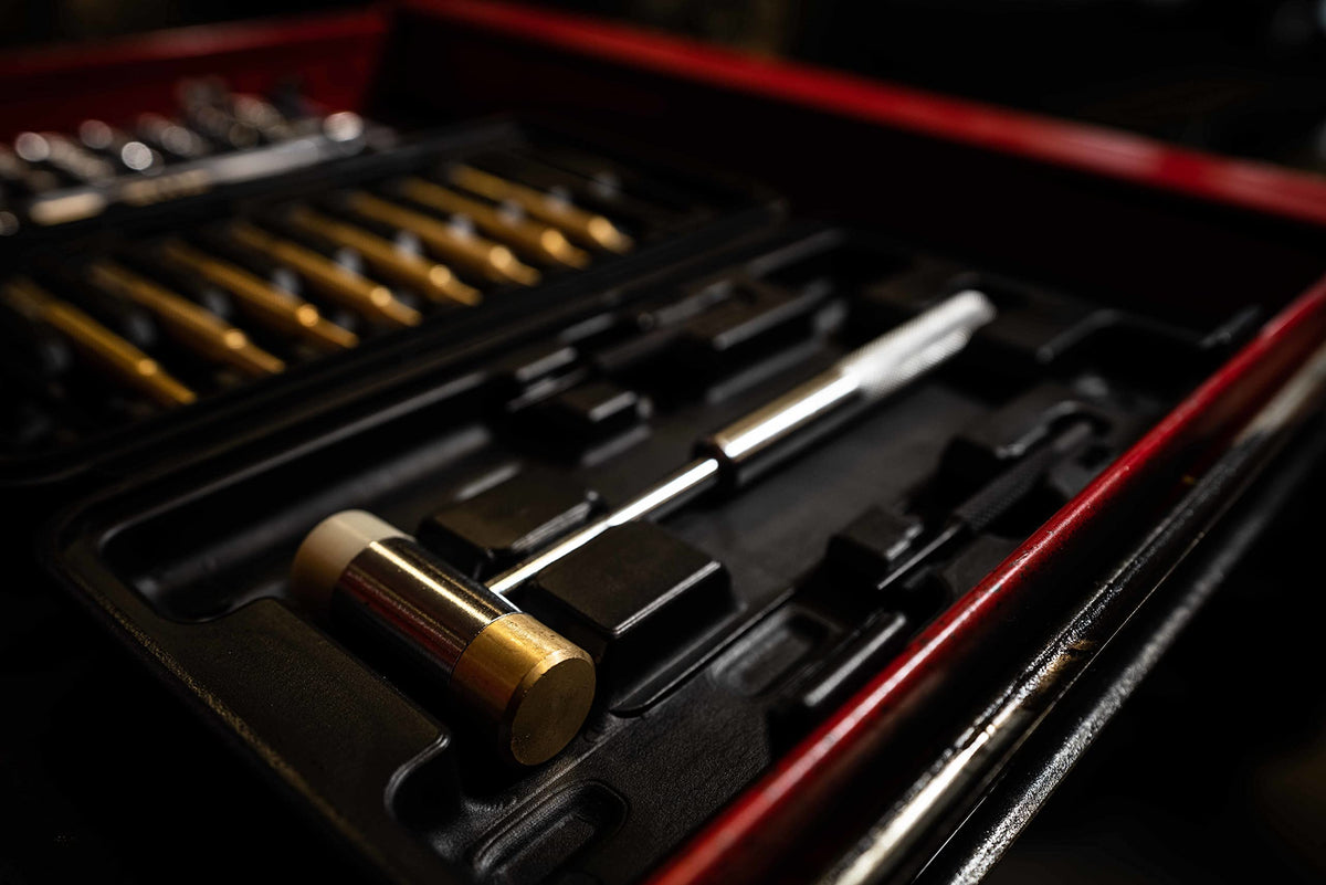 Wheeler storage case open, tools neatly organized inside