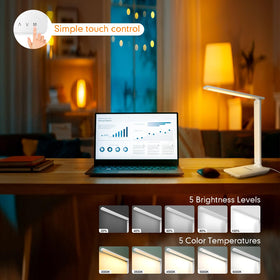 White Crown lamp with built-in USB port for extra device charging.