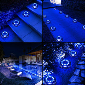 WILUX twelve pack solar lights provide bright blue glow across yards.