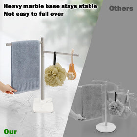 Weighted marble base with pads provides stable footing on surface