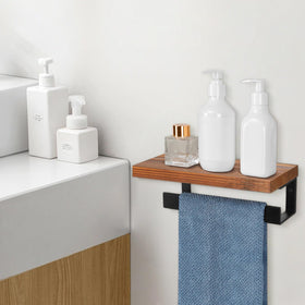 Winmien towel rack shelf holds phone, wipes, and small items.